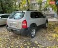 Серый Хендай Туксон, объемом двигателя 2 л и пробегом 100 тыс. км за 3700 $, фото 4 на Automoto.ua