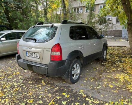 Серый Хендай Туксон, объемом двигателя 2 л и пробегом 100 тыс. км за 3700 $, фото 5 на Automoto.ua