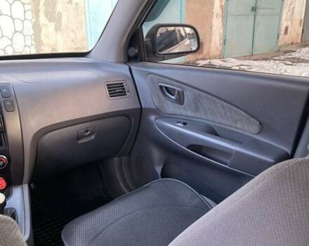 Сірий Хендай Туксон, об'ємом двигуна 1.98 л та пробігом 250 тис. км за 7900 $, фото 22 на Automoto.ua