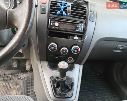 Серый Хендай Туксон, объемом двигателя 1.98 л и пробегом 267 тыс. км за 7200 $, фото 12 на Automoto.ua