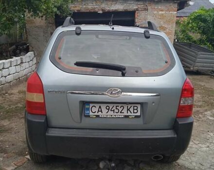 Сірий Хендай Туксон, об'ємом двигуна 1.98 л та пробігом 350 тис. км за 6400 $, фото 9 на Automoto.ua