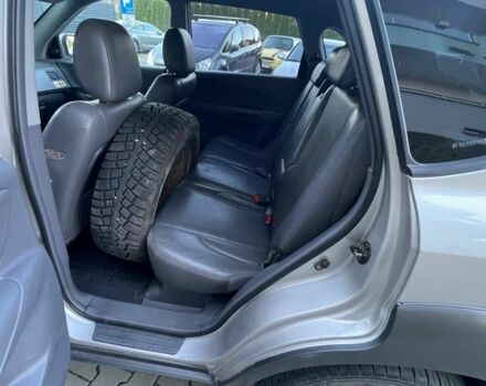 Серый Хендай Туксон, объемом двигателя 2 л и пробегом 192 тыс. км за 3479 $, фото 5 на Automoto.ua