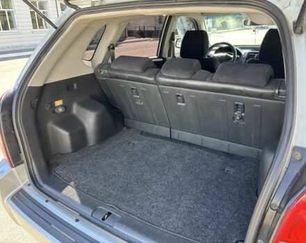 Серый Хендай Туксон, объемом двигателя 2 л и пробегом 270 тыс. км за 7300 $, фото 4 на Automoto.ua