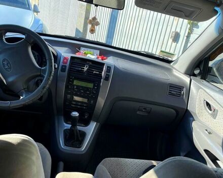 Серый Хендай Туксон, объемом двигателя 2 л и пробегом 136 тыс. км за 8200 $, фото 1 на Automoto.ua