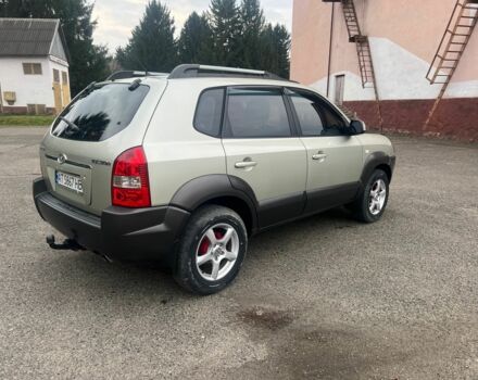 Серый Хендай Туксон, объемом двигателя 2 л и пробегом 205 тыс. км за 6700 $, фото 6 на Automoto.ua