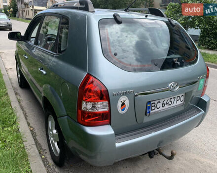 Серый Хендай Туксон, объемом двигателя 1.99 л и пробегом 194 тыс. км за 7850 $, фото 4 на Automoto.ua