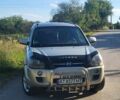 Серый Хендай Туксон, объемом двигателя 1.98 л и пробегом 322 тыс. км за 6100 $, фото 12 на Automoto.ua