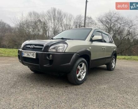 Серый Хендай Туксон, объемом двигателя 1.98 л и пробегом 205 тыс. км за 6700 $, фото 21 на Automoto.ua