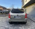 Серый Хендай Туксон, объемом двигателя 2.7 л и пробегом 172 тыс. км за 7900 $, фото 3 на Automoto.ua