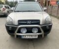 Серый Хендай Туксон, объемом двигателя 2 л и пробегом 222 тыс. км за 8500 $, фото 2 на Automoto.ua