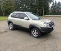 Серый Хендай Туксон, объемом двигателя 2 л и пробегом 205 тыс. км за 6700 $, фото 2 на Automoto.ua