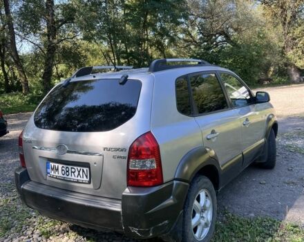 Сірий Хендай Туксон, об'ємом двигуна 2 л та пробігом 366 тис. км за 3650 $, фото 3 на Automoto.ua