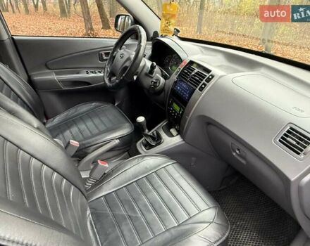 Серый Хендай Туксон, объемом двигателя 2 л и пробегом 248 тыс. км за 6599 $, фото 23 на Automoto.ua