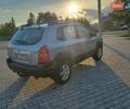 Сірий Хендай Туксон, об'ємом двигуна 1.99 л та пробігом 300 тис. км за 7700 $, фото 3 на Automoto.ua