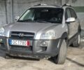 Сірий Хендай Туксон, об'ємом двигуна 2 л та пробігом 250 тис. км за 4132 $, фото 1 на Automoto.ua