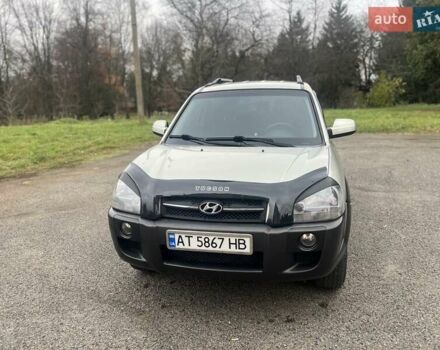 Серый Хендай Туксон, объемом двигателя 1.98 л и пробегом 205 тыс. км за 6700 $, фото 13 на Automoto.ua