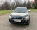 Серый Хендай Туксон, объемом двигателя 1.98 л и пробегом 205 тыс. км за 6700 $, фото 13 на Automoto.ua