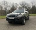 Серый Хендай Туксон, объемом двигателя 1.98 л и пробегом 205 тыс. км за 6700 $, фото 4 на Automoto.ua
