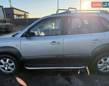 Серый Хендай Туксон, объемом двигателя 1.99 л и пробегом 215 тыс. км за 5980 $, фото 7 на Automoto.ua