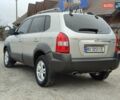 Серый Хендай Туксон, объемом двигателя 1.99 л и пробегом 210 тыс. км за 7900 $, фото 2 на Automoto.ua