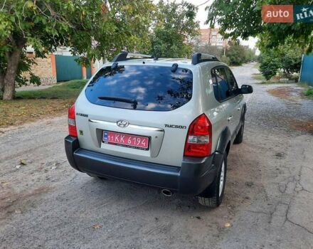 Сірий Хендай Туксон, об'ємом двигуна 2 л та пробігом 197 тис. км за 7800 $, фото 41 на Automoto.ua