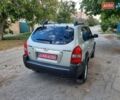 Сірий Хендай Туксон, об'ємом двигуна 2 л та пробігом 197 тис. км за 7800 $, фото 41 на Automoto.ua