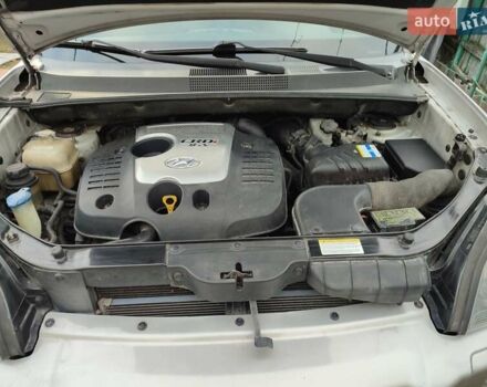 Серый Хендай Туксон, объемом двигателя 1.99 л и пробегом 178 тыс. км за 6700 $, фото 18 на Automoto.ua