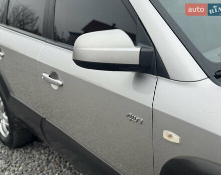 Серый Хендай Туксон, объемом двигателя 1.98 л и пробегом 241 тыс. км за 7000 $, фото 28 на Automoto.ua