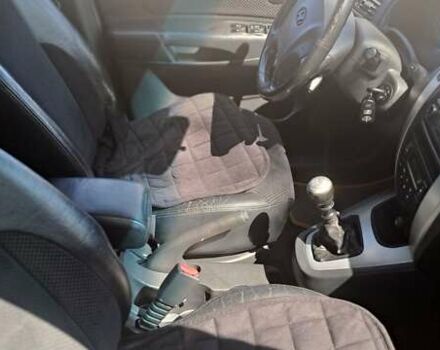 Сірий Хендай Туксон, об'ємом двигуна 2 л та пробігом 297 тис. км за 7300 $, фото 9 на Automoto.ua