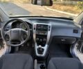 Серый Хендай Туксон, объемом двигателя 2 л и пробегом 188 тыс. км за 8800 $, фото 12 на Automoto.ua