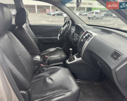 Серый Хендай Туксон, объемом двигателя 1.98 л и пробегом 175 тыс. км за 7800 $, фото 14 на Automoto.ua