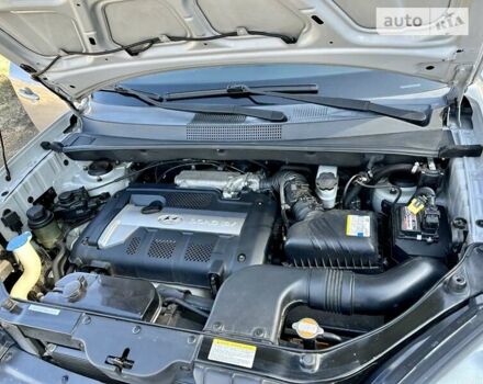 Сірий Хендай Туксон, об'ємом двигуна 1.98 л та пробігом 166 тис. км за 9800 $, фото 15 на Automoto.ua