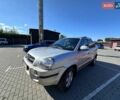 Сірий Хендай Туксон, об'ємом двигуна 1.98 л та пробігом 227 тис. км за 7500 $, фото 1 на Automoto.ua