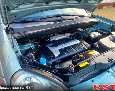 Серый Хендай Туксон, объемом двигателя 2 л и пробегом 175 тыс. км за 6250 $, фото 11 на Automoto.ua