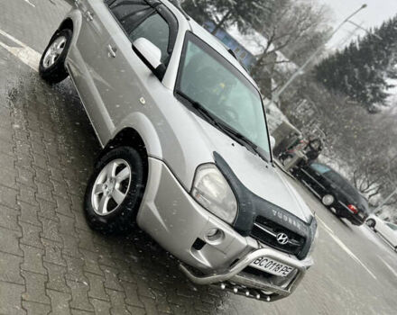 Сірий Хендай Туксон, об'ємом двигуна 1.99 л та пробігом 252 тис. км за 6700 $, фото 16 на Automoto.ua