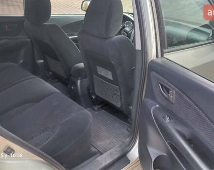 Серый Хендай Туксон, объемом двигателя 1.99 л и пробегом 303 тыс. км за 6500 $, фото 11 на Automoto.ua