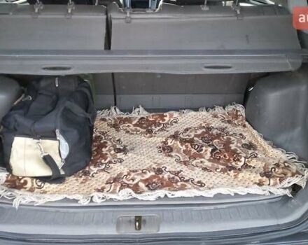 Серый Хендай Туксон, объемом двигателя 2 л и пробегом 207 тыс. км за 7500 $, фото 6 на Automoto.ua