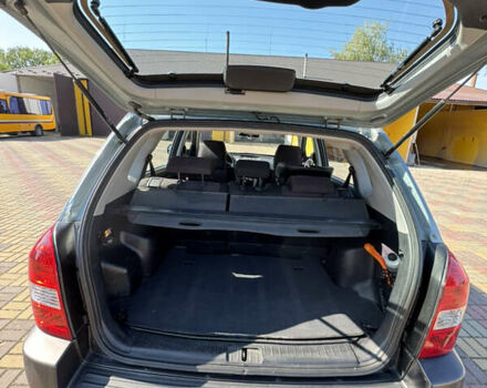 Серый Хендай Туксон, объемом двигателя 1.98 л и пробегом 207 тыс. км за 7050 $, фото 6 на Automoto.ua