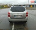 Серый Хендай Туксон, объемом двигателя 1.98 л и пробегом 250 тыс. км за 7300 $, фото 4 на Automoto.ua