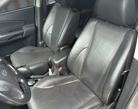 Серый Хендай Туксон, объемом двигателя 1.98 л и пробегом 193 тыс. км за 6500 $, фото 16 на Automoto.ua