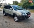 Сірий Хендай Туксон, об'ємом двигуна 2 л та пробігом 197 тис. км за 7800 $, фото 33 на Automoto.ua