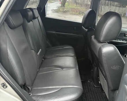 Серый Хендай Туксон, объемом двигателя 1.98 л и пробегом 193 тыс. км за 6500 $, фото 34 на Automoto.ua