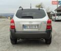 Серый Хендай Туксон, объемом двигателя 1.99 л и пробегом 210 тыс. км за 7900 $, фото 3 на Automoto.ua