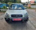 Сірий Хендай Туксон, об'ємом двигуна 2 л та пробігом 197 тис. км за 7800 $, фото 9 на Automoto.ua