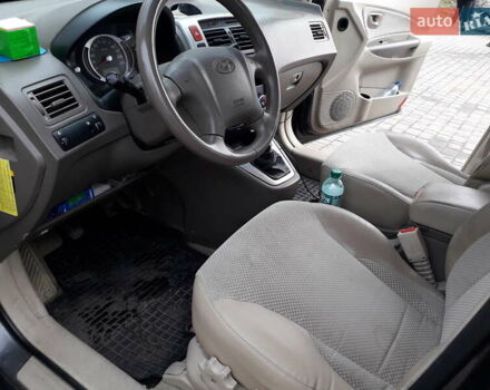 Сірий Хендай Туксон, об'ємом двигуна 2 л та пробігом 304 тис. км за 7500 $, фото 5 на Automoto.ua