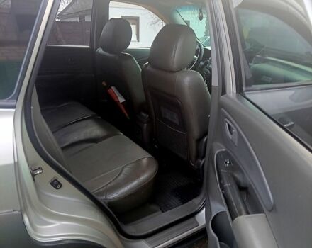 Сірий Хендай Туксон, об'ємом двигуна 2 л та пробігом 300 тис. км за 7000 $, фото 6 на Automoto.ua