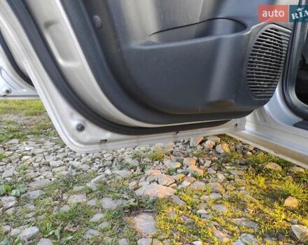 Сірий Хендай Туксон, об'ємом двигуна 1.98 л та пробігом 160 тис. км за 6900 $, фото 11 на Automoto.ua