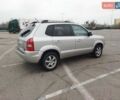 Серый Хендай Туксон, объемом двигателя 1.98 л и пробегом 278 тыс. км за 5300 $, фото 10 на Automoto.ua