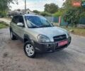 Сірий Хендай Туксон, об'ємом двигуна 2 л та пробігом 197 тис. км за 7800 $, фото 5 на Automoto.ua