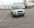 Серый Хендай Туксон, объемом двигателя 1.98 л и пробегом 278 тыс. км за 5300 $, фото 3 на Automoto.ua